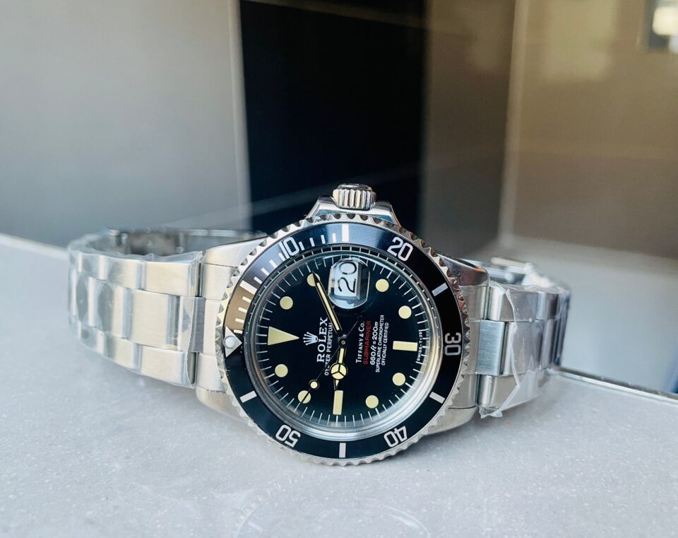 Vintage Rolex Submariner Date Tiffany & Co 16610A30B9315 Black dial with SS bracelet