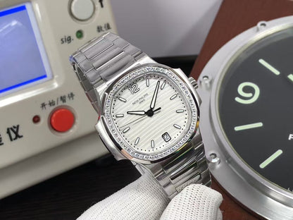 pp Nautilus Lady 7118 35mm 324 Movement Diamond Bezel White Dial