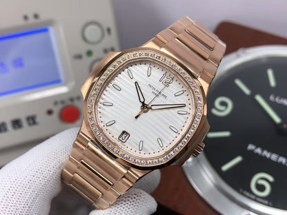 pp Nautilus Ladies 7118 Rose Gold Case White Dial Diamond Bezel with 324 Movement